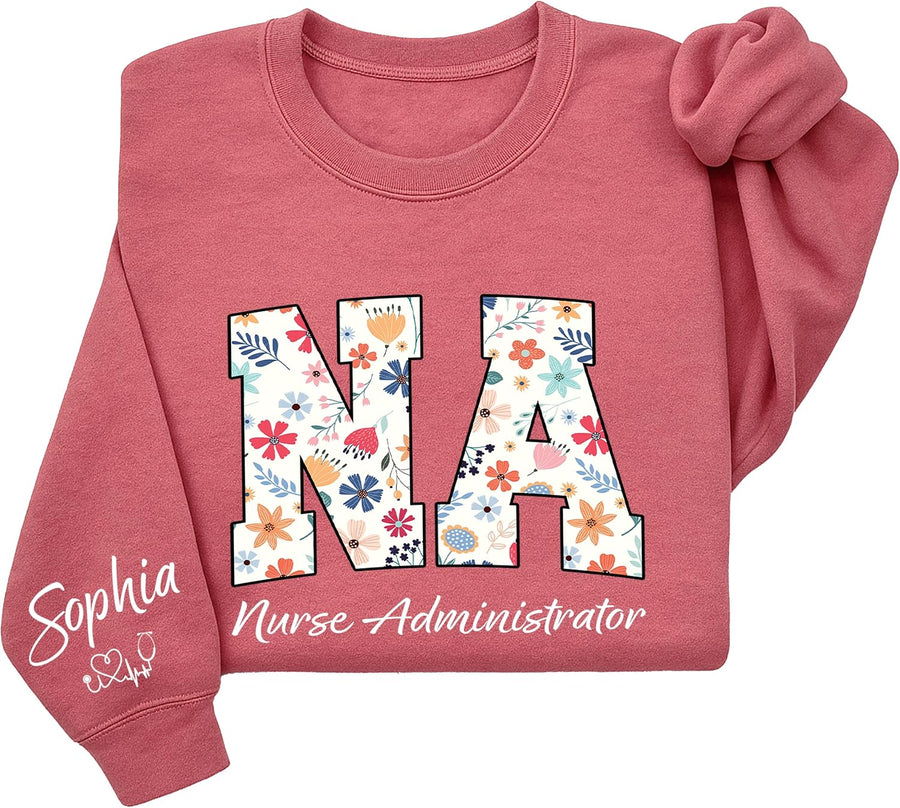 Personalized Nurse Sweatshirt with Floral Letters, Custom Name Sleeve, Gift for Medical Staff Uniform - Nurse Administrator