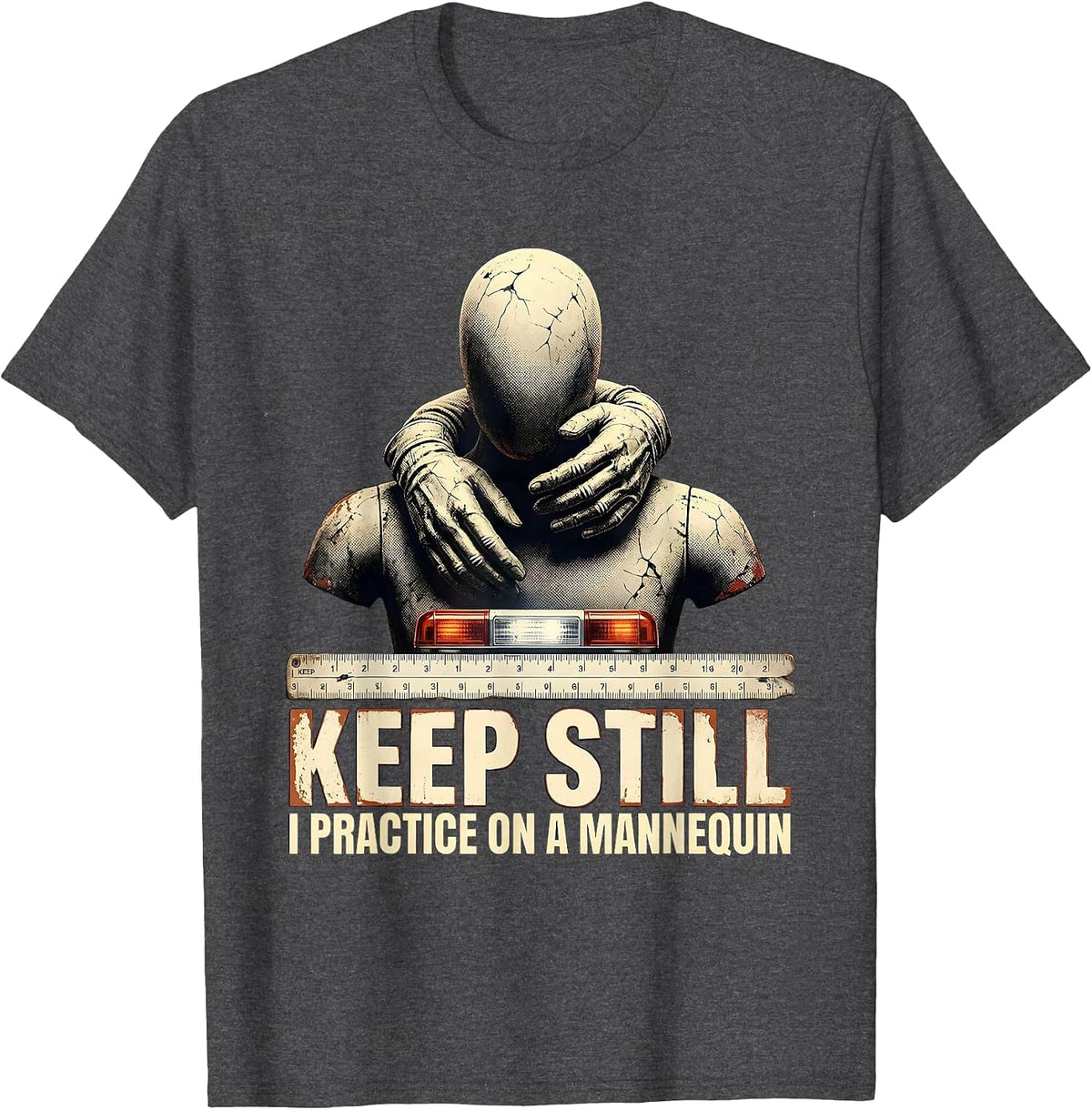 Men's Keep Still I Practice On A Mannequin Funny EMT Paramedic Gag T-Shirt - Dark Heather Grey
