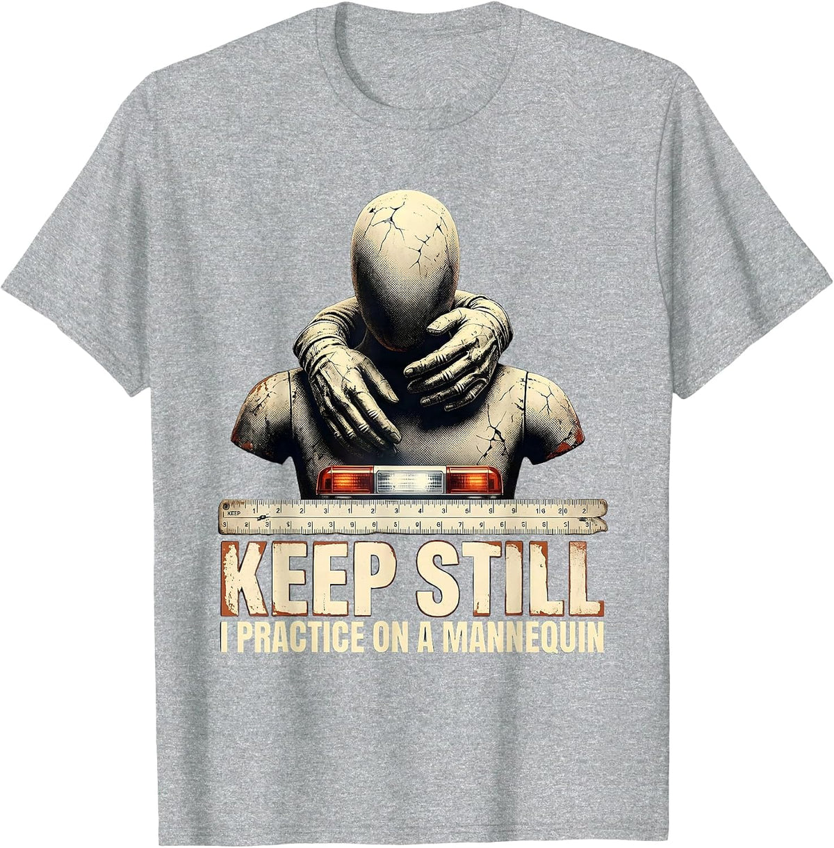 Men's Keep Still I Practice On A Mannequin Funny EMT Paramedic Gag T-Shirt - Heather Grey